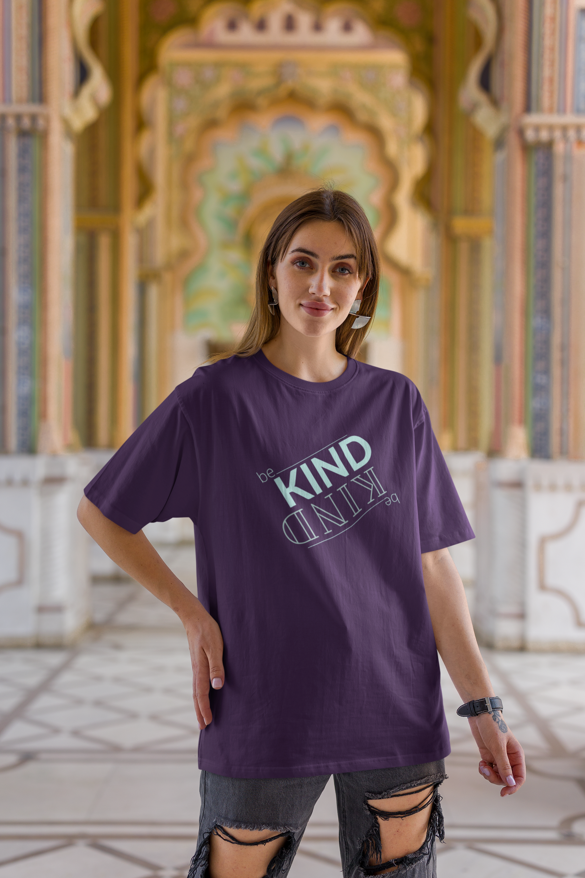 Oversized Black tshirt in Purple color with the slogan Be Kind