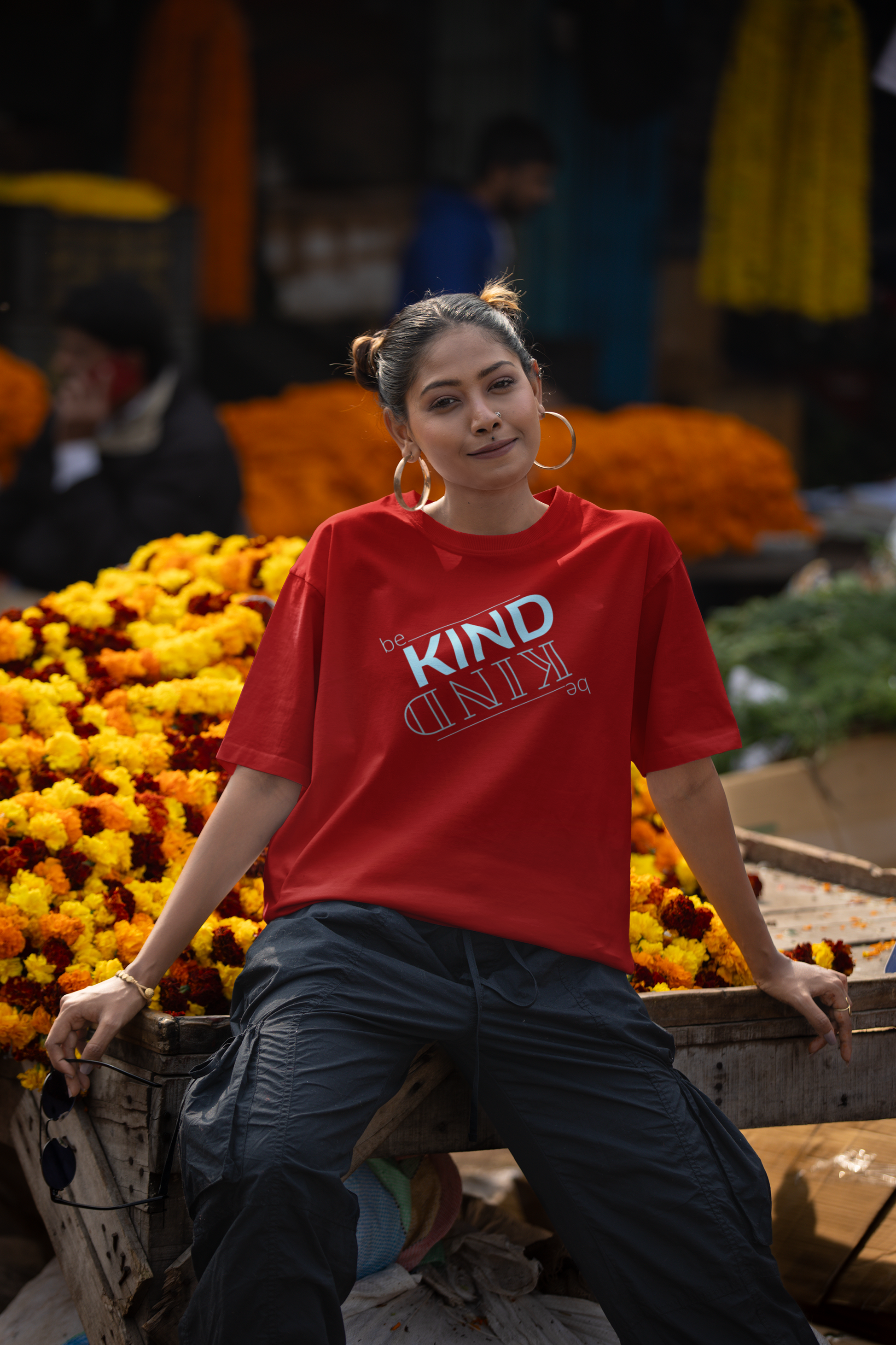 Oversized Black tshirt in RED color with the slogan Be Kind